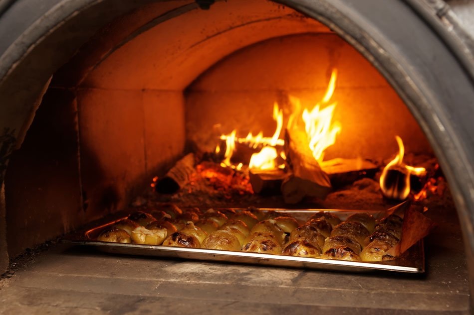 How To Cook Pizza With An Outdoor Wood Fired Oven